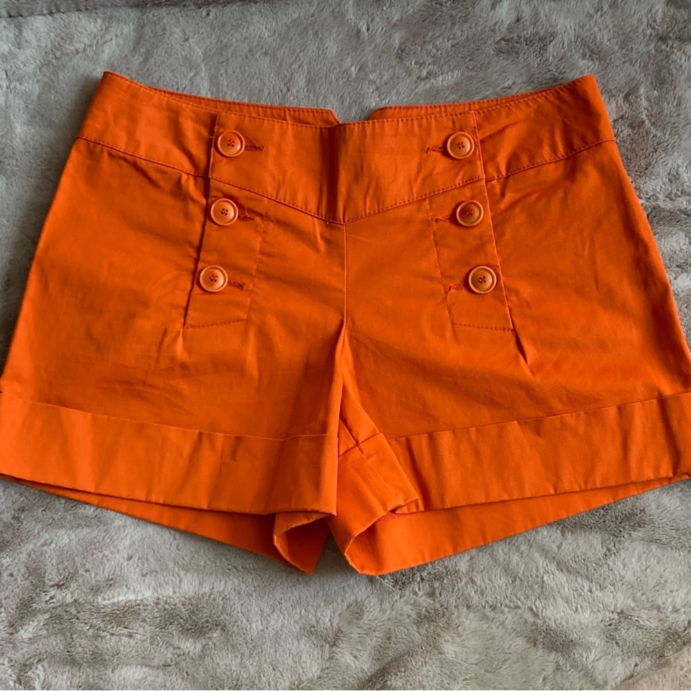 Trina Turk Orange Button front mini shorts Women’s size 0